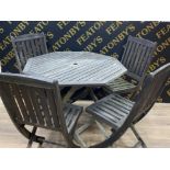 Octagonal shaped slatted garden table and 4 folding chairs