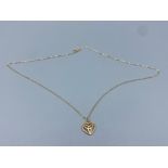 9ct gold heart shape celtic pendant and 9ct gold chain, 1.17g 41cm