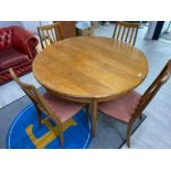 Teak G-Plan circular extending dining table & 4 matching chairs