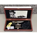 John Wayne presentation set, includes revolver style pocket knife, sheriff’s badge & holster, all in