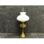 Vintage brass oil lamp complete with glass globe and chimney