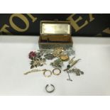 Vintage pewter miniature chest containing miscellaneous brooches etc