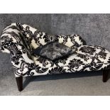 Contemporary chaise longue, upholstered in a black & white floral design