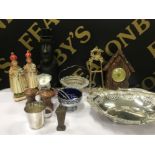 2 boxes of miscellaneous to include brass ornate easel religious figures ornaments salt and pepper