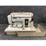 Vintage Newhome 543210 sewing machine in original carry case