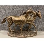 Large bronze effect ornament of a pair of trotting horses - length 46cm x height 30cm