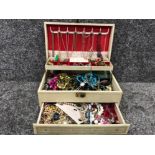 Jewellery chest containing miscellaneous costume jewellery to include gold plated necklaces