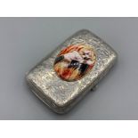 An antique silver case with female nude enamel panel