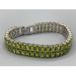 A substantial silver and peridot double row bracelet 41g
