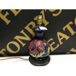 Moorcroft pottery baluster table lamp in the anemone pattern 25cm