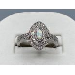 A silver art deco style silver ring set with opal penelin a morquoise shape, 4.3g size S