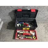 A tool containing miscellaneous tools such as spanners drill bits tape measures etc