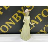 Nao by Lladro figure of an elegant lady with flower