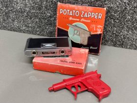 Genuine classic Lagoon Potato Zapper (spud gun) together with folding opera glasses both with
