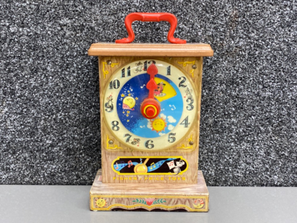 1960s Fisher-Price Tick Tock teaching clock, in good working condition