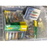 Box of misc fishing lures including power storm and Rödskär