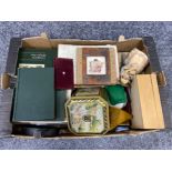 Box of miscellaneous including antique child’s books, religious figures, railway books, fishing reel