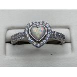 A silver and cz heart shaped opal set ring , 2.9g size O