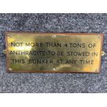 Antique brass sign on wooden base “Not more then 4 tons of anthracite to be stowed in this bunker at