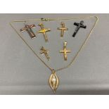 A Sarah Coventry pendant on chain alongside 6 cross style pendants