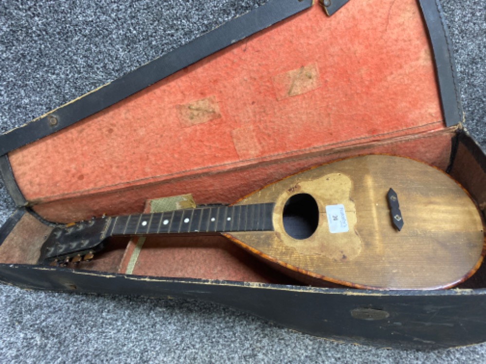 Old Mandolin in original case (needs re-stringed)
