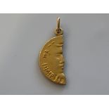 Solid 18ct gold half face pendant 5.2g - collection from the 27th August