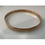 9ct gold bangle. 13.8g, - collection from the 27th August