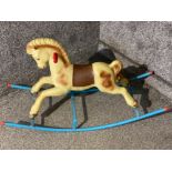 Vintage plastic and metal rocking horse