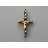 9ct gold crucifix pendant 0.7g, - collection from the 27th August
