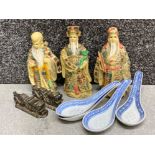 Oriental lot comprising of 3 Chinese figures, pair of metal “foo dragon design” chopstick holders