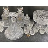 Selection of crystal glassware including decanters, beakers, lidded pot & large bowl