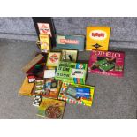 Box containing miscellaneous boxed games including monopoly, scrabble & Grandstand TV game etc