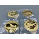 A lot of 4 Concorde gold plated coins with certificates of authenticity