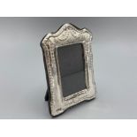 A silver easel back picture frame