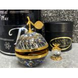 Tone a crystal plus lidded mirror in the form of an apple plus one other crystal glass ornament,