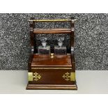 Two bottle oak and brass tantalus, includes 2 small Royal scot crystal decanters and 2 small Royal