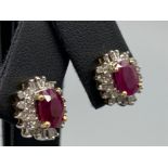 A pair of 14ct white gold substantial ruby and diamond earrings 2.5ct’s approx., 3.8g