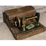 Vintage oak cased singer sewing machine