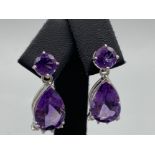 An impressive pair of silver and pear shaped Amethyst drop earrings, 7.4g