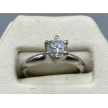 An 18ct white gold single stone diamond ring of 65 points approx., 4.1g size I1/2