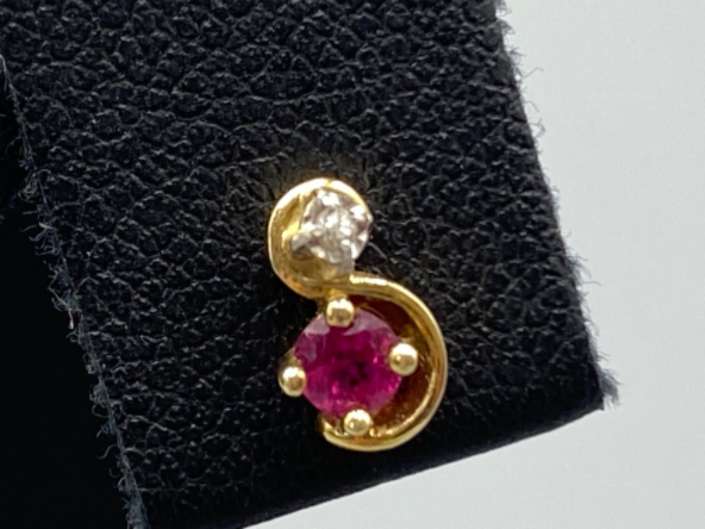 A pair of yellow gold ruby and diamond stud earrings, 1.1g - Image 2 of 3