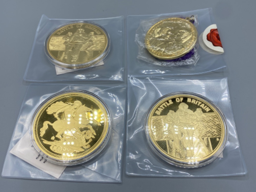 A lot of 4 gold plated coins including 2 battle of Britain coins and dancing on ice, 3 include