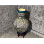 Large oriental style floor vase on wooden stand, height 78cm