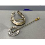 Solid silver stick pin in the shape of a horse shoe and matching brooch