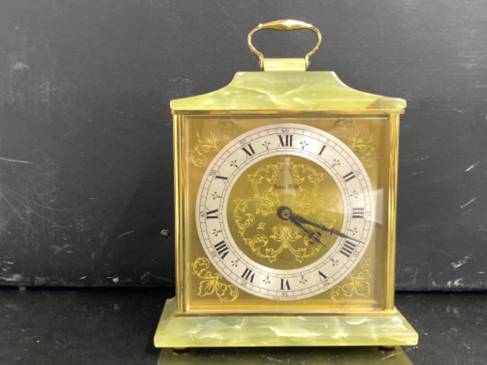 A reproduction jade and brass style mantle clock by James White