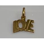 18ct gold “Love” pendant/charm. 1.7g