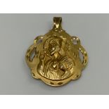 Stunning 18ct gold large pendant (religious themed) 11.6g (slight dent)