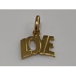 18ct gold “Love” pendant/charm. 1.7g