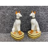 A good pair of Egyptian style pottery dogs