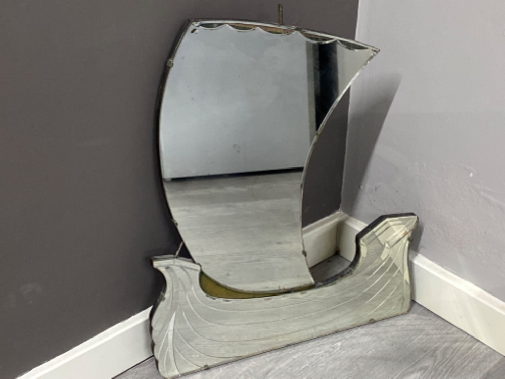 Large ship shaped mirror